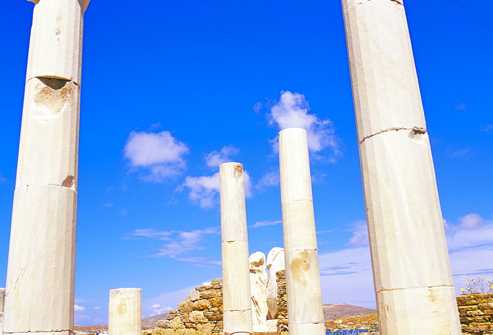 Columns surrounding ancient statues of Cleopatra and Diocrides, archaeological site of Delos, UNESCO World Heritage Site, Cyclades islands, Greece, Mediterranean, Europe