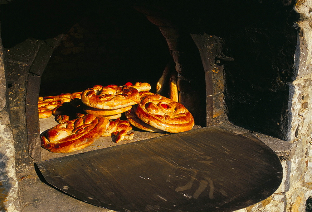 Eastern bread baked in outdoor communal oven, Olymbos (Olimbos), Karpathos, Dodecanese islands, Greece, Mediterranean, Europe