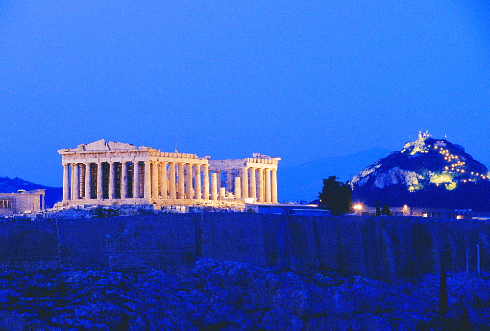 The Acropolis illuminated by floodlight, Athens, Greece