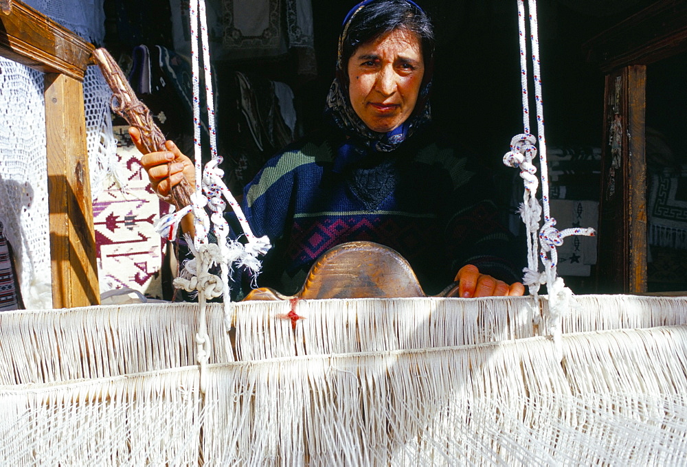 Local weaver spinning wool, Lassithi Plateau, island of Crete, Greece, Mediterranean, Europe