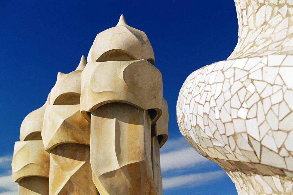 The bizarre chimneys of Gaudi's Casa Mila, La Pedrera, Barcelona, Catalonia (Catalunya) (Cataluna), Spain, Europe