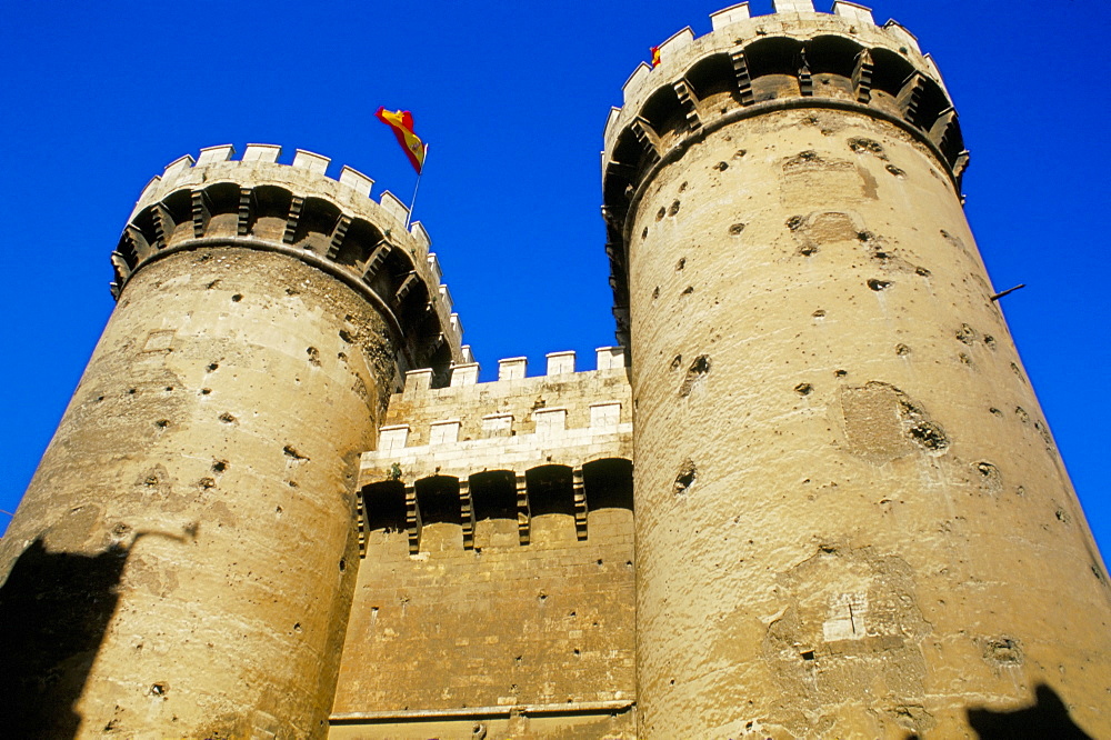 Twin towered stone gates of Torres de Quart, in old city walls, Valencia, Spain, Europe