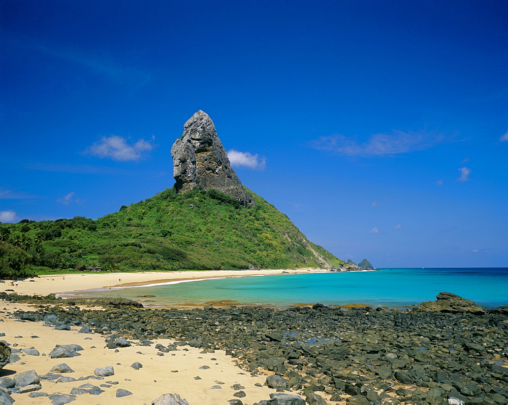 View of Praia do Conceicao beach and Morro do Pico in the background, Parque Nacional de Fernando de Norohna, Fernando de Noronha, Pernambuco, Brazil, South America