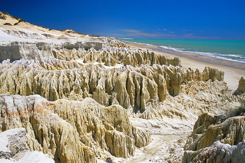 Rock formations and coastline near Canoa Quebrada, Canoa Quedrada, Ceara', Brazil, South America