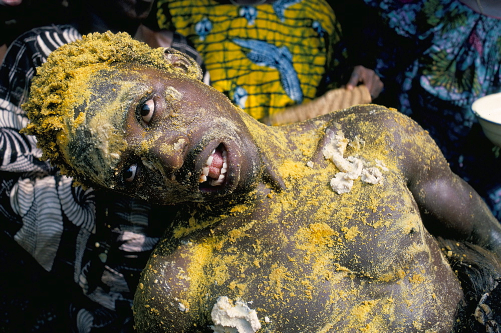 Man in trance during voodoo ceremony, Abomey, Benin (Dahomey), Africa