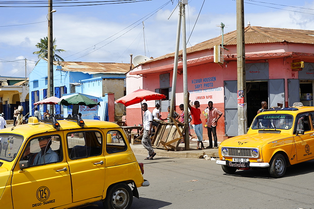 Yellow taxi. Antsiranana (Diego-Suarez), northern tip of the island, Diana Region. Madagascar, Africa