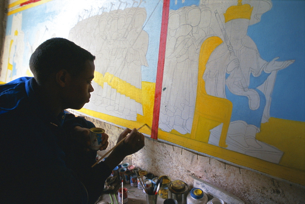 Boy working in Aleka Gamid Gidey painting workshop, Zege peninsula, Lake Tana, Gondar region, Ethiopia, Africa