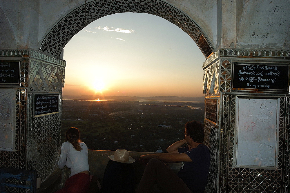 Tourists watching sunset from Mandalay Hill, Mandalay,  Myanmar (Burma), Asia