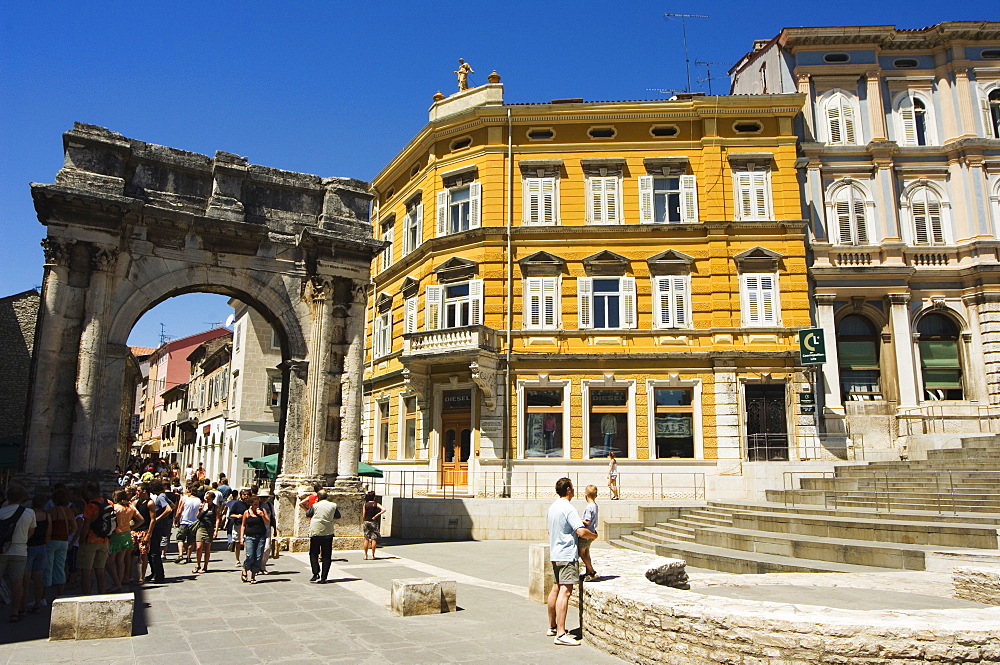 Stone arch in Old Town, Pula, Istria Coast, Croatia, Europe