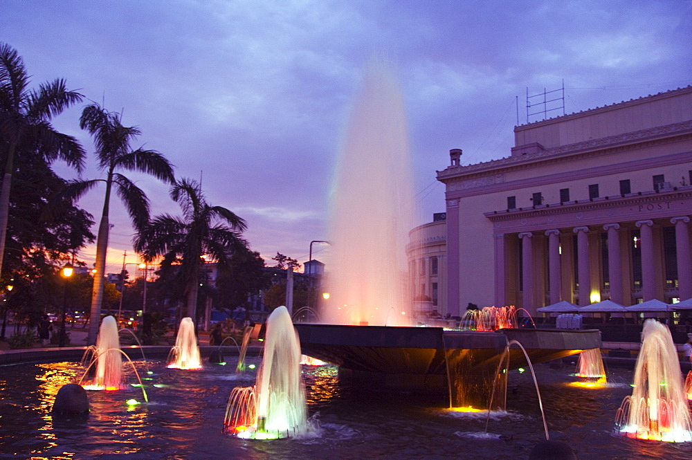 Fountain at sunset, Rizal Park, Intramuros District, Manila, Philippines, Southeast Asia, Asia