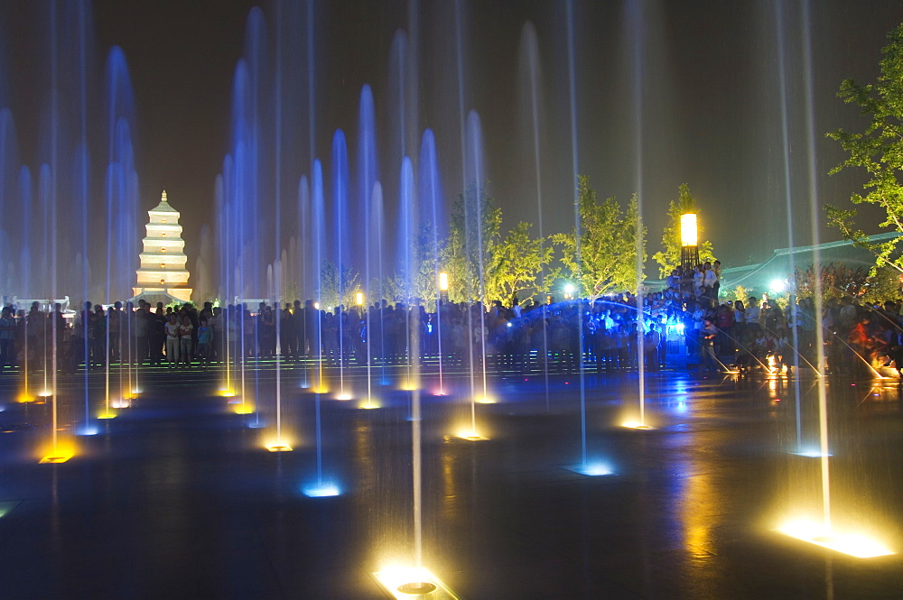 Night time water show at the Big Goose Pagoda Park, Tang dynasty built in 652 by Emperor Gaozong, Xian City, Shaanxi Province, China, Asia