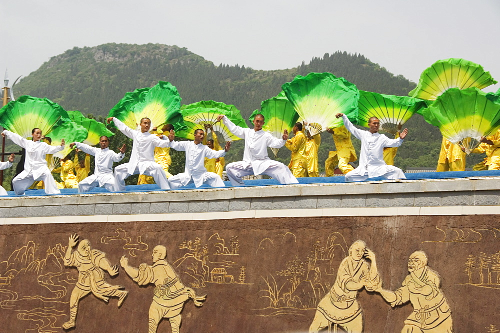 Kung fu students displaying their skills at a tourist show within Shaolin Temple, Shaolin, birthplace of Kung Fu martial art, Henan Province, China, Asia