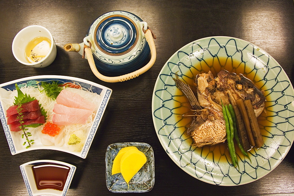 A traditional Japanese meal of sushi and fish head, Tokyo, Honshu Island, Japan, Asia