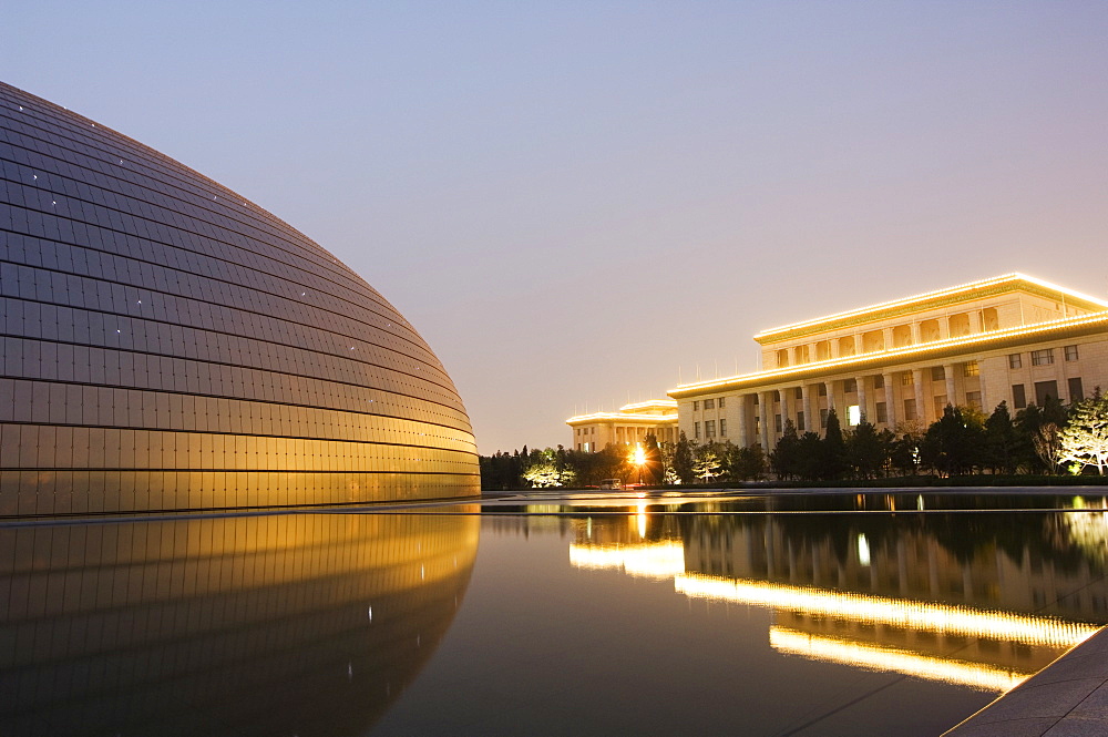 Soviet style Great Hall of the People contrasts with The National Theatre Opera House, also known as The Egg designed by French architect Paul Andreu and made with glass and titanium opened 2007, Beijing, China, Asia