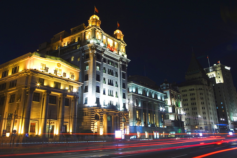 Car light trails and illuminated buildings on the Bund, Shanghai, China, Asia