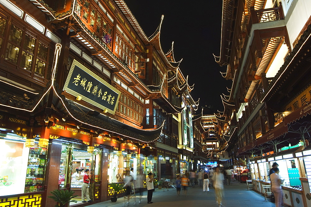 Yuyuan (Yu yuan) Garden Bazaar buildings founded by Ming dynasty Pan family illuminated in the Old Chinese city district, Shanghai, China, Asia