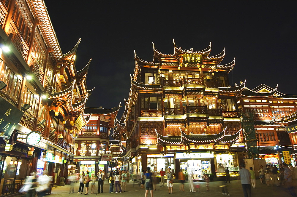 Yuyuan (Yu yuan) Garden Bazaar buildings founded by Ming dynasty Pan family illuminated in the Old Chinese city district, Shanghai, China, Asia