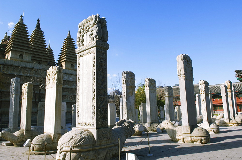 A five towered temple and Ancestral tombs inscribed with dead persons contributions life and honours at Zhen Jue temple, Beijing, China, Asia