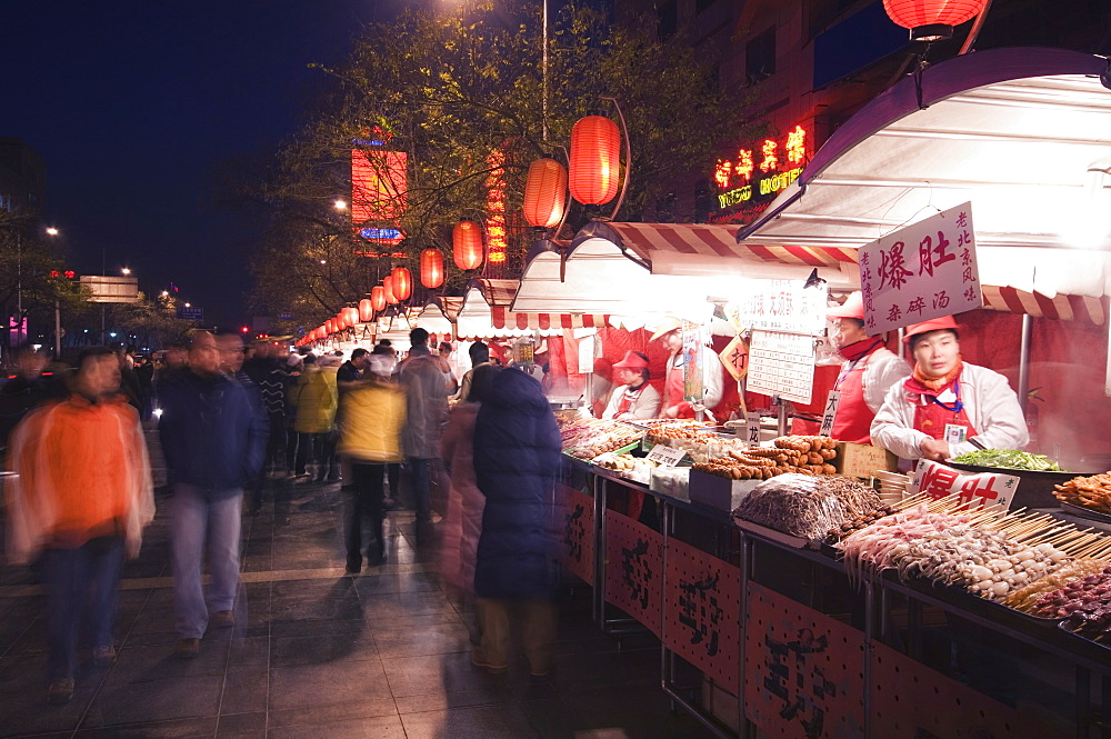 A street market selling local food in Wangfujing shopping street, Beijing, China, Asia