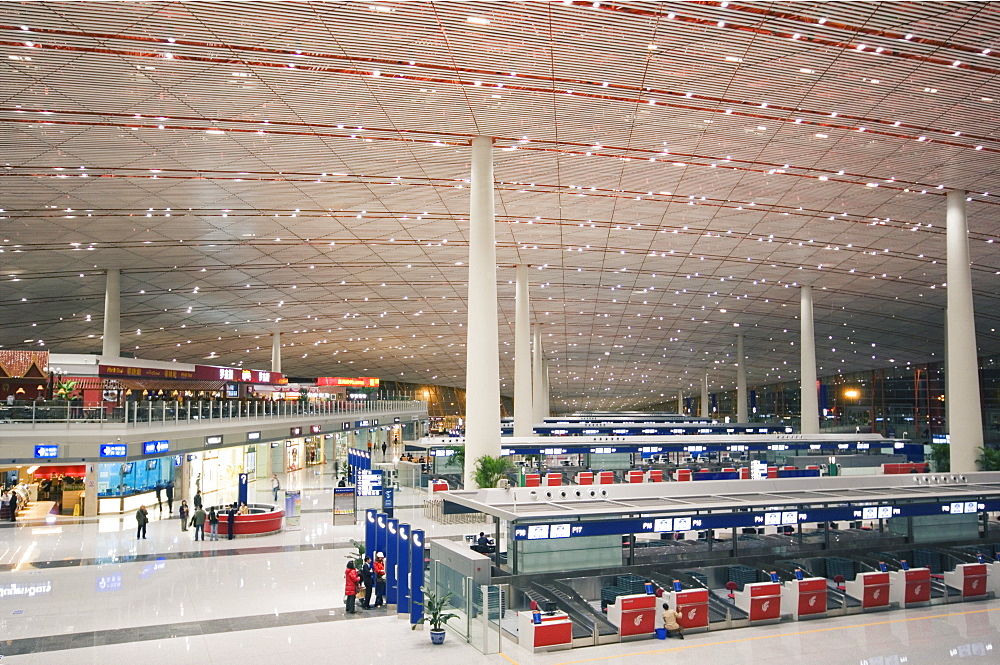 Check-in counters at Beijing Capital Airport, part of new Terminal 3 building opened February 2008, second largest building in the world, Beijing, China, Asia