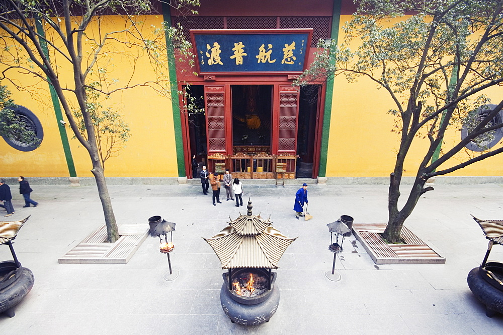 People visiting Lingyin Temple built in AD 326 in Lingyin Temple Forest Park, Hangzhou, Zhejiang Province, China, Asia