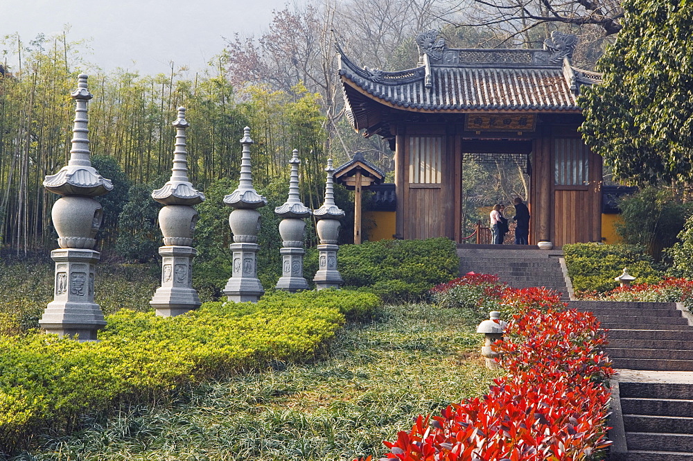 Stone lantern statues at Lingyin Temple Forest Park, Hangzhou, Zhejiang Province, China, Asia