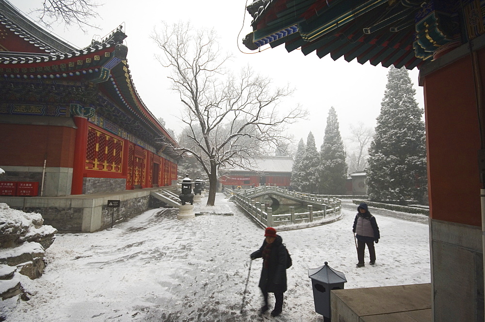 Visitors to a temple after winter snow, Fragrant Hills Park, Western Hills, Beijing, China, Asia