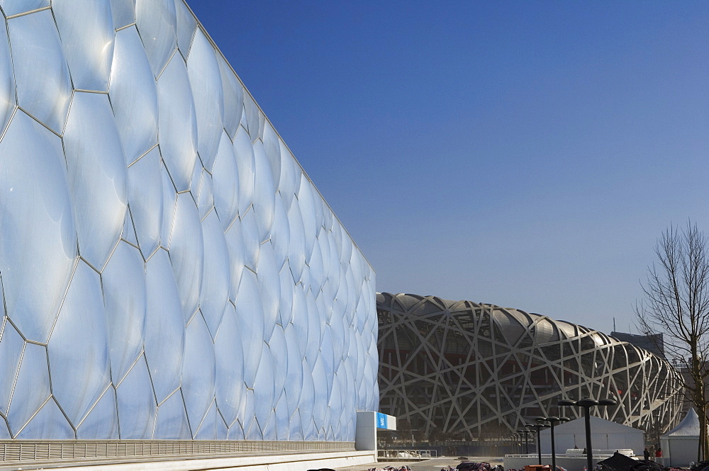 The Water Cube National Aquatics Center swimming arena and National Stadium at the Olympic Park, Beijing, China, Asia