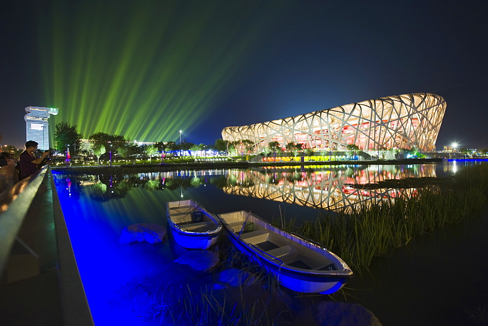 A night time light show at the Birds Nest National Stadium during the 2008 Olympic Games, Beijing, China, Asia