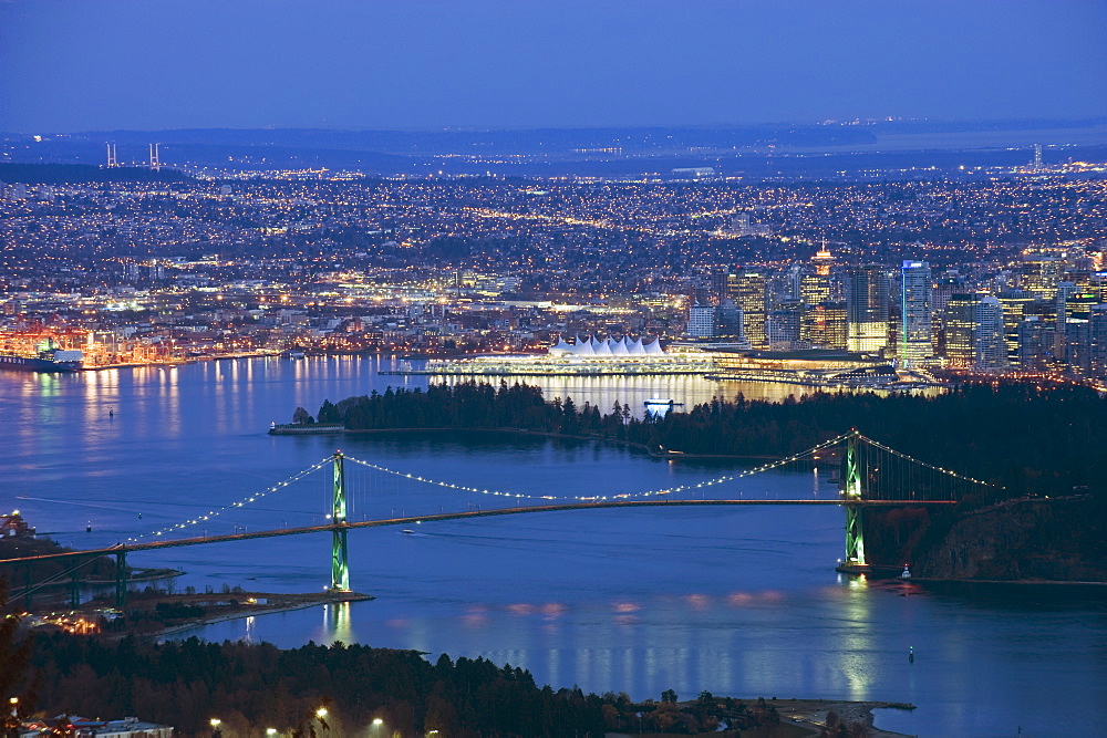 Night view of city skyline and Lions Gate Bridge, from Cypress Provincial Park, Vancouver, British Columbia, Canada, North America