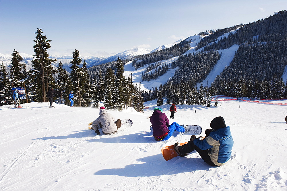 Snowboarders at Whistler mountain resort, venue of the 2010 Winter Olympic Games, British Columbia, Canada, North America