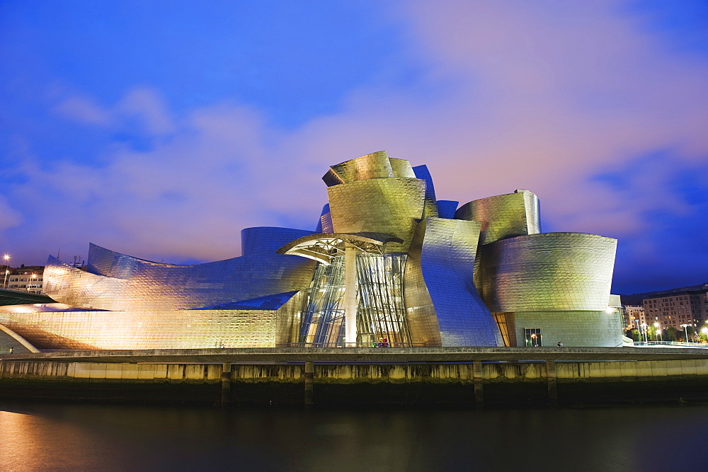 The Guggenheim, designed by Canadian-American architect Frank Gehry, on the Nervion River, Bilbao, Basque country, Spain, Europe