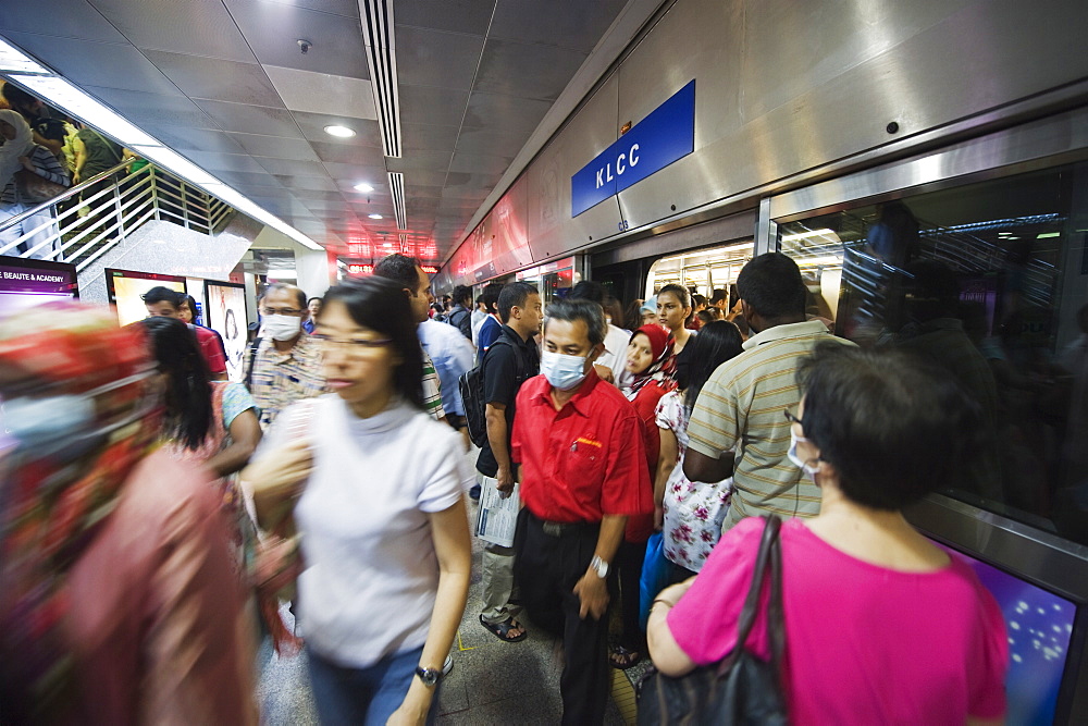 Underground train passengers, Kuala Lumpur, Malaysia, Southeast Asia, Asia