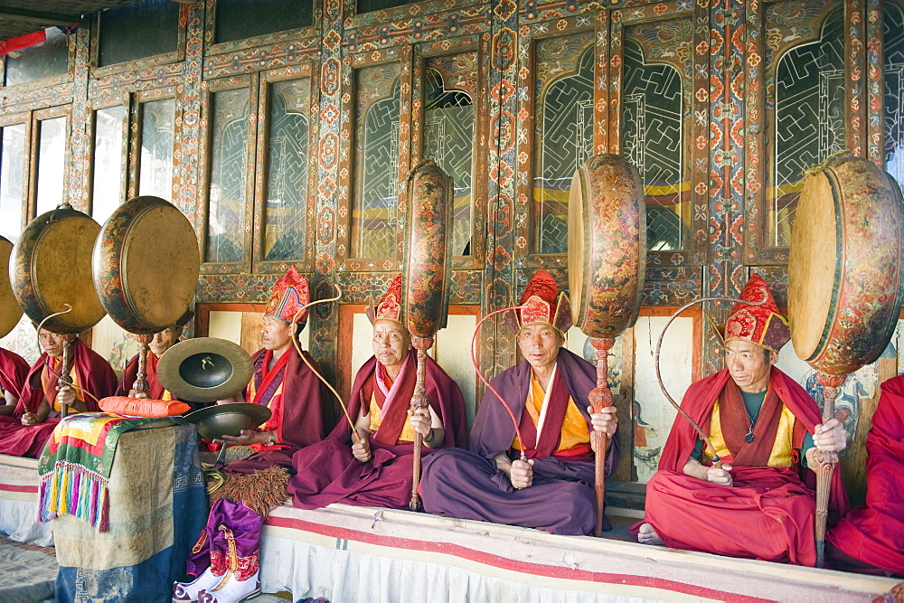 Monks playing drums at a Tsechu (festiva), Gangtey Gompa (Monastery), Phobjikha Valley, Bhutan, Asia