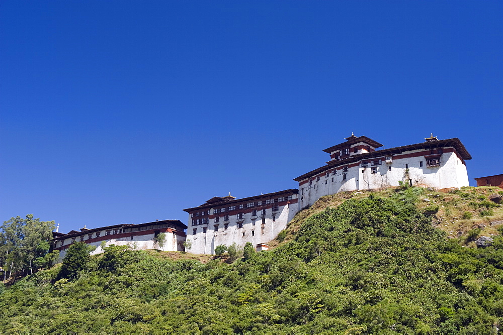 Ridge top Wangdue Phodrang Dzong, founded by the Zhabdrung in 1638, Bhutan, Asia