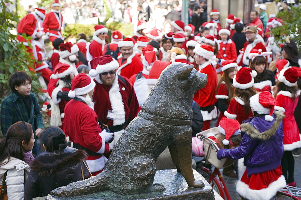 Christmas Santas meeting at Hachiko dog meeting point, Shibuya ward, Tokyo, Japan, Asia