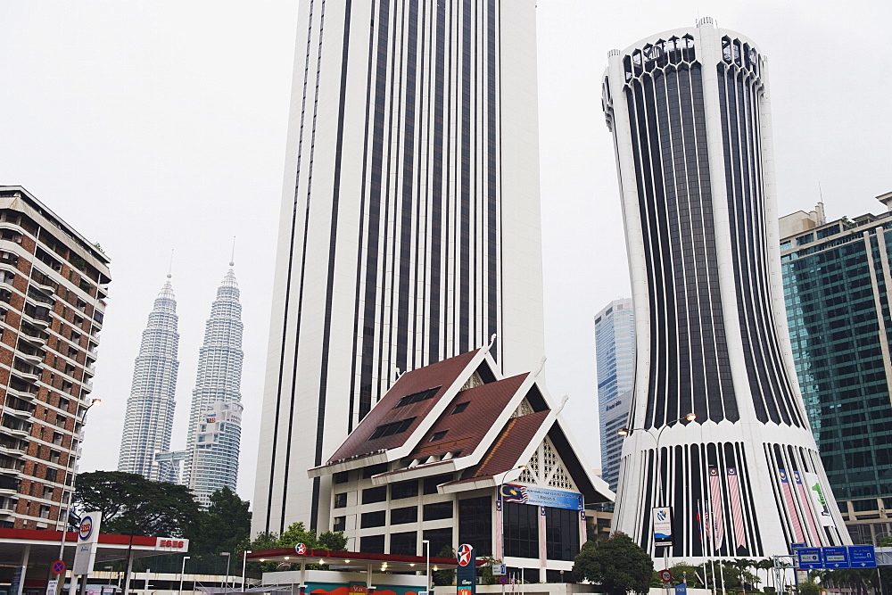 Petronas Towers and Tabung Haji Building, designed by Hijas Katsuri, Kuala Lumpur, Malaysia, Southeast Asia, Asia