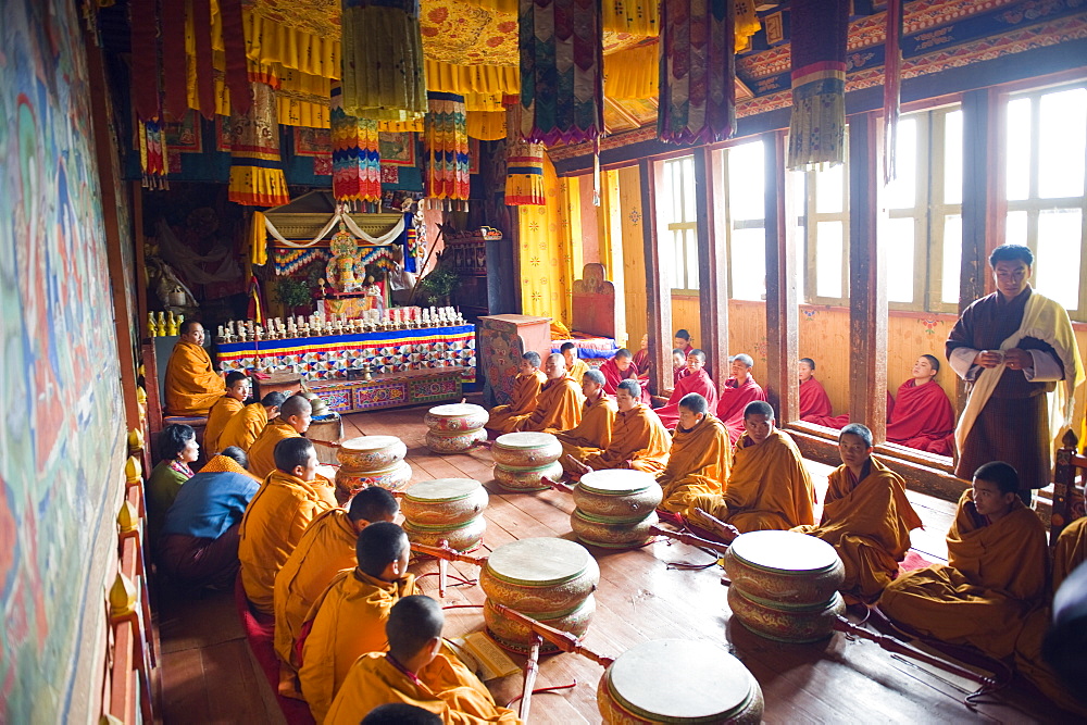 Monks with drums at a ceremony in Jakar Dzong, Castle of the White Bird, Jakar, Bumthang, Chokor Valley, Bhutan