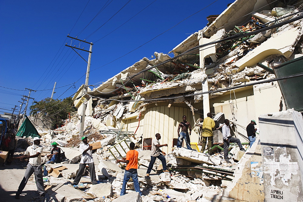 Stock being removed from The Caribbean Market, January 2010 earthquake damage, Port au Prince, Haiti, West Indies, Caribbean, Central America