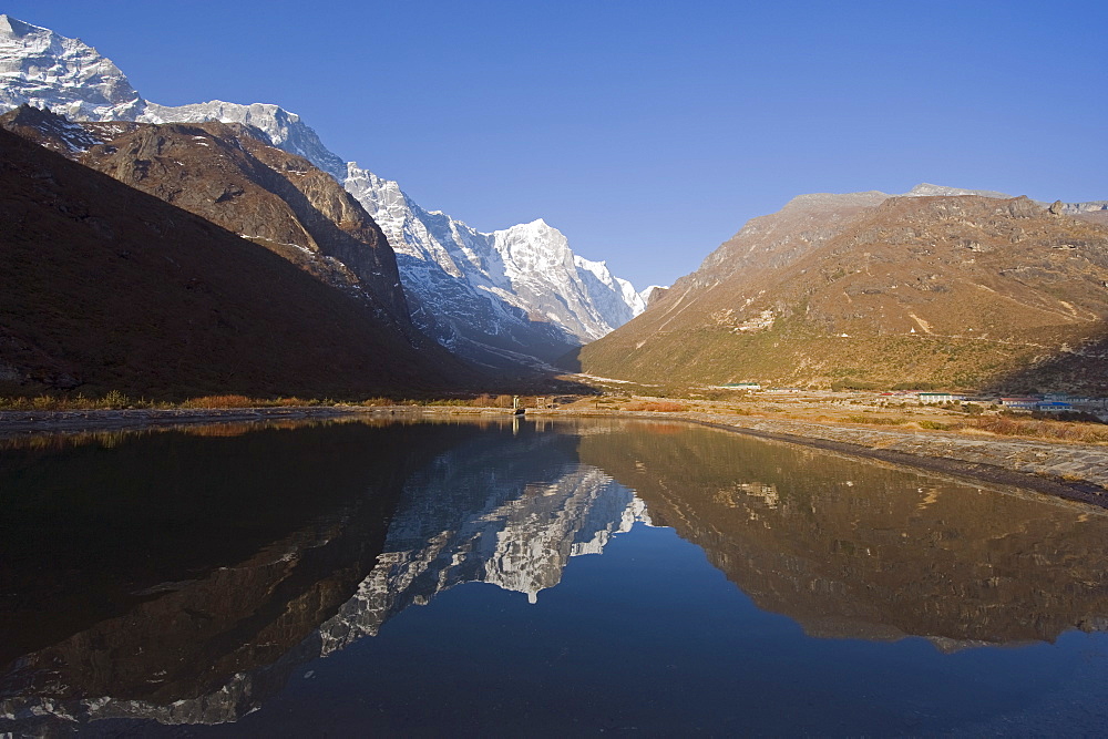 Mountains reflected in a lake, Thame, Solu Khumbu Everest Region, Sagarmatha National Park, Nepal, Asia