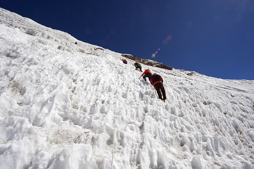 Climbers on an ice wall, Island Peak 6189m, Solu Khumbu Everest Region, Sagarmatha National Park, Himalayas, Nepal, Asia