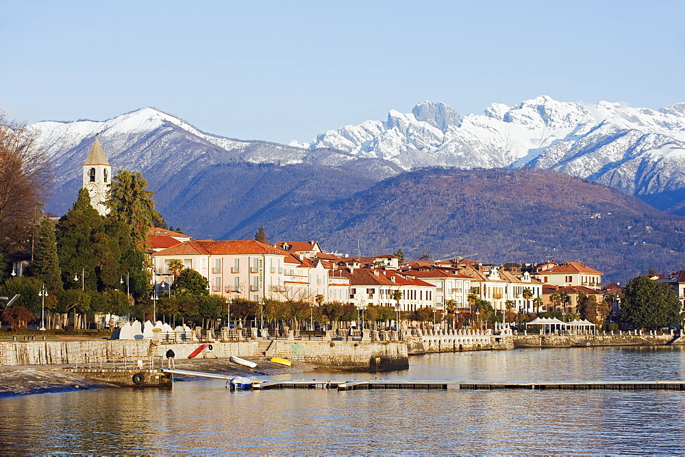 Snow capped mountains above Stresa waterfront, Lake Maggiore, Italian Lakes, Piedmont, Italy, Europe