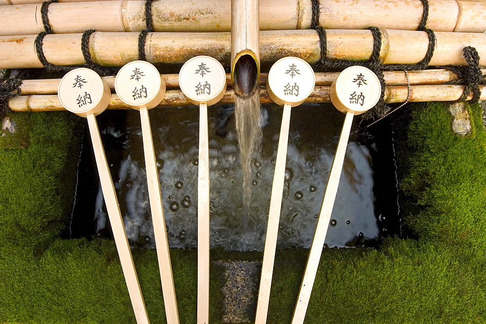 Water ladles, shaku, Nishiki Tenmangu shrine, Kyoto city, Honshu, Japan. Asia