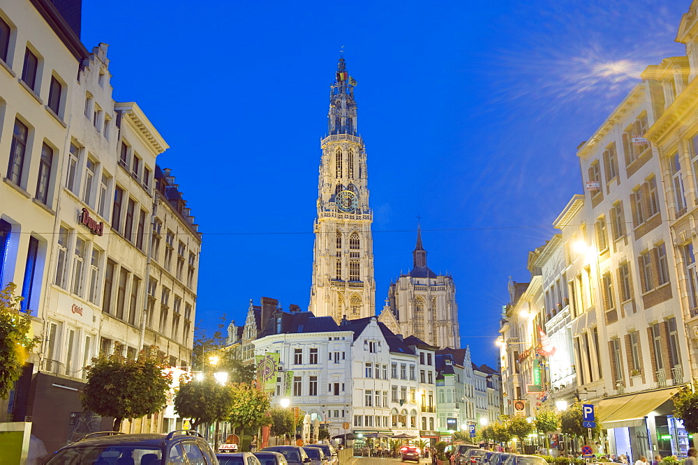 Tower of Onze Lieve Vrouwekathedraal and street illuminated at night, Antwerp, Flanders, Belgium, Europe