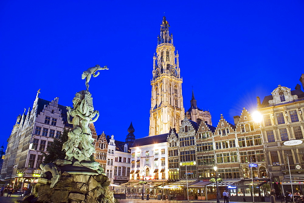 Baroque Brabo fountain, Grote Markt and tower of Onze Lieve Vrouwekathedraal, at night, Antwerp, Flanders, Belgium, Europe