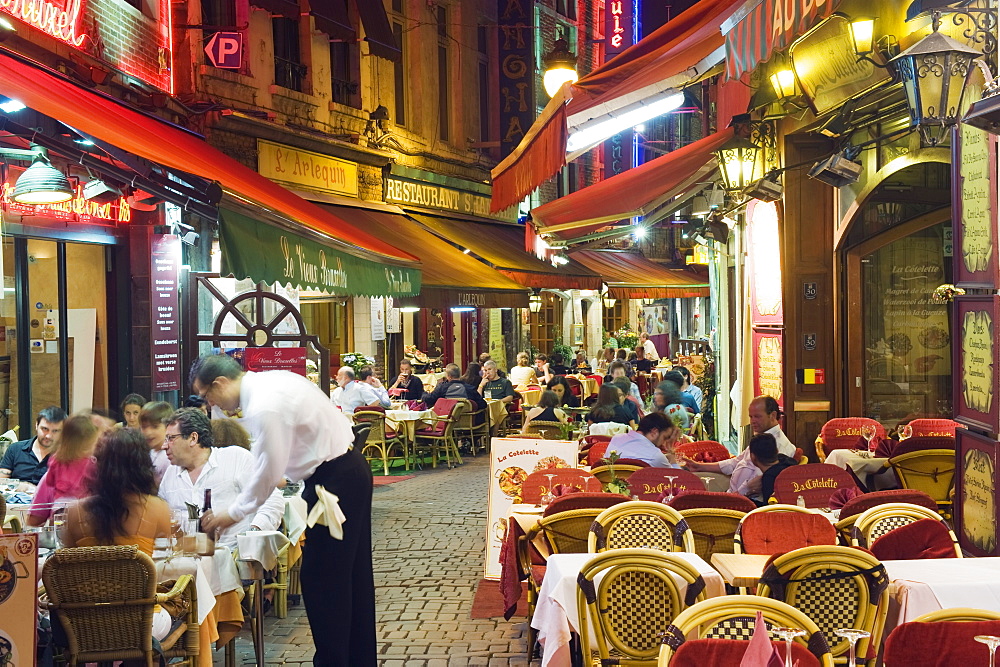 Outdoor dining in narrow street of restaurants, Brussels, Belgium, Europe