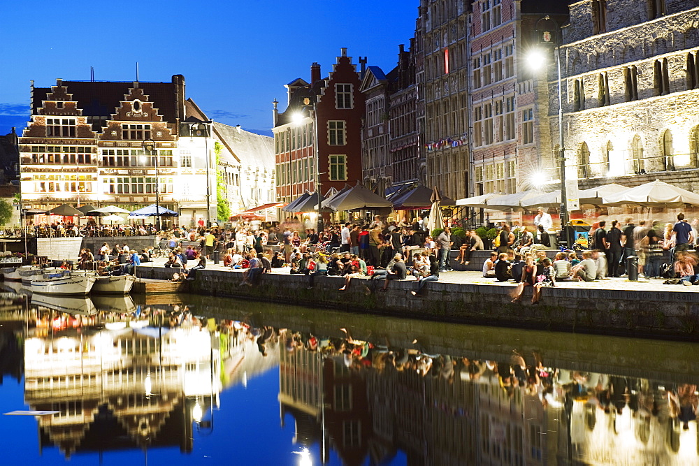 Night time reflection of waterfront town houses, Ghent, Flanders, Belgium, Europe