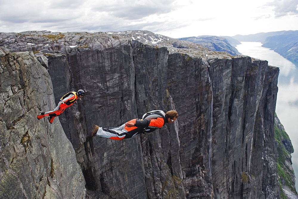 Base jumping at Lyseboten, Lysefjord, Norway, Scandinavia, Europe