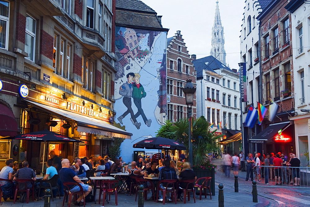 Outdoor cafes and Brousaille wall mural of a couple walking arm in arm, Brussels, Belgium, Europe