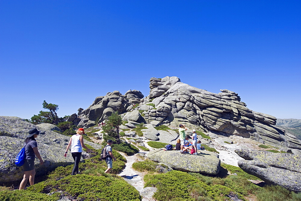 Hikers at Sietos Picos (Seven Peaks), in Guadarrama, Madrid, Spain, Europe